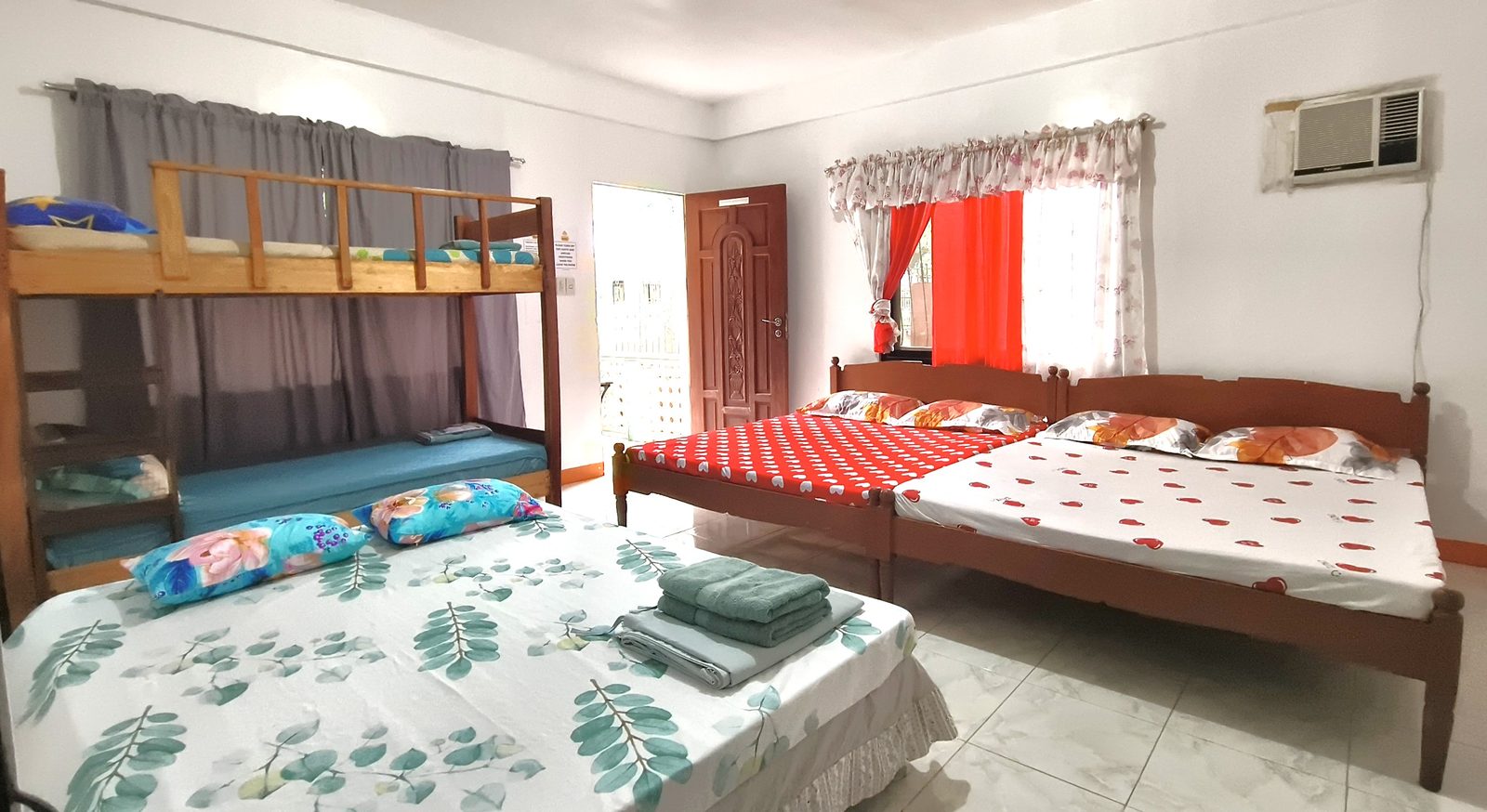 Talipanan Beach Room, laid out with doubles and a bunk bed